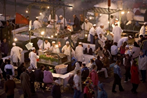 Mingling Prints: Elevated view over Djemaa el-Fna in the evening when