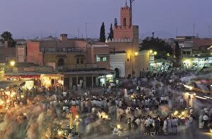 Elevated view over Djemaa el-Fna in the evening when the square is filled with food stalls, Marrakech (Marrakesh)