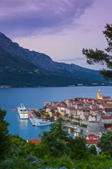 Korcula Prints: Elevated view over Korculas picturesque Stari Grad (Old Town) illuminated at dusk