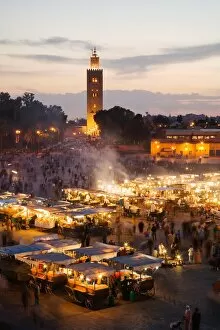 Images Dated 24th May 2006: Elevated view of the Koutoubia Mosque at dusk from Djemaa el-Fna, Marrakech, Morocco