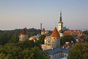Elevated view of lower Old Town with Oleviste Church in the background, UNESCO World Heritage Site, Tallinn, Estonia