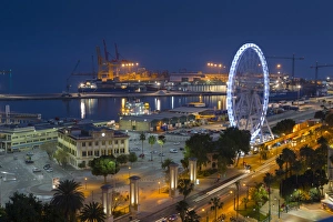 Ferris Wheel Prints: Elevated view of Malaga Marina and ferris wheel at dusk, Malaga, Costa del Sol, Andalusia