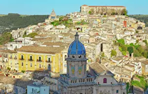 Ragusa Prints: Elevated view of Santa Maria dell'Itria and Ragusa Ibla showing rooftops and distant hills in central Sicily
