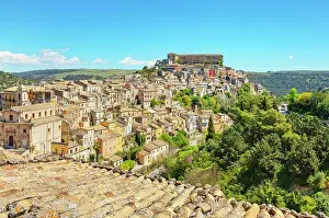 Ragusa Prints: Elevated view showing the architecture and landscape of Ragusa Ibla in Sicily during a clear day with blue sky