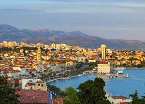 Elevated view over Splits picturesque Stari Grad and harbour illuminated at sunset, Split, Dalmatia, Croatia, Europe Elevated view over Splits picturesque Stari Grad and harbour illuminated at sunset, Split, Dalmatia, Croatia, Europe