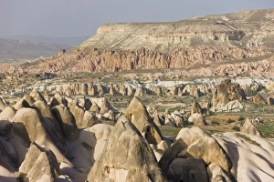 Elevated view over the volcanic tufa rock formations surrounding Goreme Elevated view over the volcanic tufa rock formations surrounding Goreme