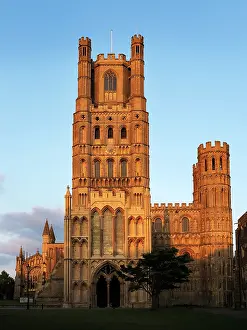 Arts Prints: Ely Cathedral stands tall against the backdrop of a beautiful sunset in Cambridgeshire