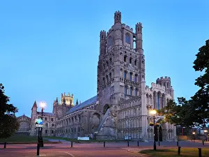 Cambridgeshire Prints: Ely Cathedral stands tall against the evening sky in Ely Cambridgeshire as dusk falls