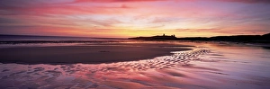 Day Break Prints: Embleton Bay at sunrise, low tide, with Dunstanburgh Castle in distance