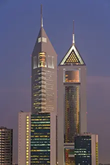 Illuminating Prints: Emirates Towers on Sheikh Zayed Road illuminated at dusk