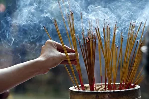 Close Up View Prints: Emperor Jade pagoda (Chua Phuoc Hai), incense sticks on joss stick pot burning