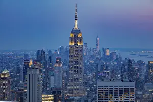 High Rises Prints: Empire State Building and New York City skyline at dusk from Top of the Rock