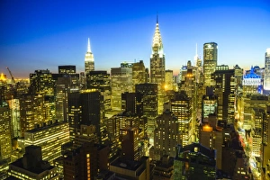 Typically American Prints: The Empire State and Chrysler buildings, Manhattan skyline at dusk, New York City