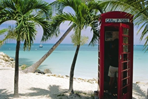 Telephone Box Prints: English telephone box on the beach, Dickensons Bay, North-East coast