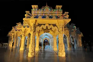 Gujarat Prints: Entrance to the beautiful white marble Swaminarayan Temple, illuminated for evening