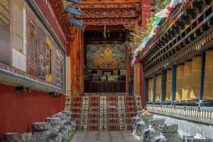 Sculptures Prints: Entrance to a Tibetan Buddhist temple features wood carvings