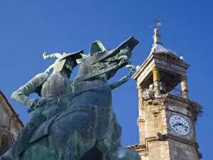 Images Dated 5th June 2007: Equestrian statue of Francisco Pizarro in the Plaza Mayor, clock-tower of the Iglesia de San