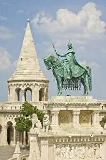 Images Dated 17th July 2010: Equestrian statue of King Stephen with the towers and conical turrets of the neo-romanesque