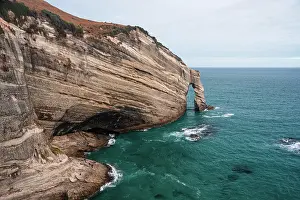 Zealand Prints: Eroded cliffs and rugged coastlines show natural beauty at Cape Farewell in South Island New Zealand