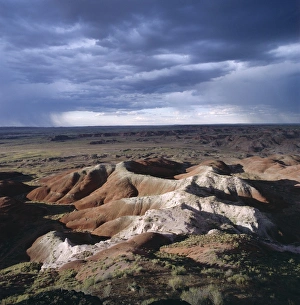 Painted Desert Prints: Eroded rocks under an overcast stormy sky