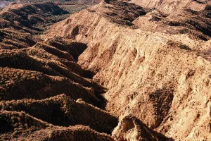 Granada Prints: Eroded valleys and layered hills display the natural landscape in Desierto de Gorafe badlands of Granada