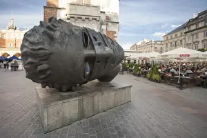 Metal Prints: Eros Bendato, bronze sculpture by Igor Mitoraj in Rynek Glowny, the main market square