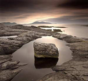 Images Dated 6th November 2008: Erratic in tidal pool on isle of Taransay, looking towards Toe Head on South Harris