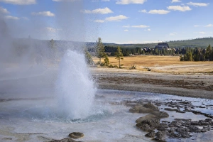 Geyser Prints: Erupting geyser and Old Faithful Inn