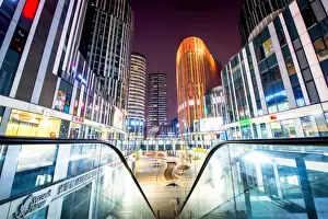 Beijing Prints: Escalator railings and illuminated futuristic architecture at Sanlitun SOHO, Beijing