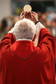 Senior Man Prints: Eucharist celebration in a Roman Catholic church, La Roche-sur-Foron, Haute-Savoie