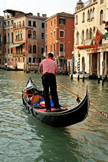 Canal Prints: Evening picture of a gondolier on the Grand Canal, Venice, UNESCO World Heritage Site