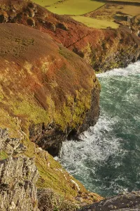 United Prints: Evening sunlight highlights the cliffs