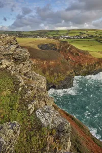 Great Prints: Evening sunlight illuminating cliffs along the Atlantic coast near Boscastle in Cornwall Great Britain