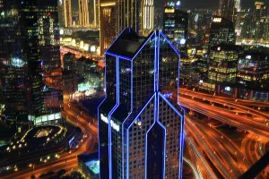 Skyscrapers Prints: Evening view of central Dubai with Burj Khalifa illuminated