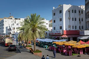 Restaurant Prints: Evening view of restaurants on the Corniche at Muttrah, Muscat, Oman, Middle East