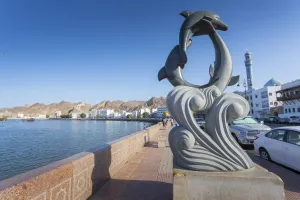 Corniche Prints: Evening view of a sculpture on the Corniche at Muttrah, Muscat, Oman, Middle East