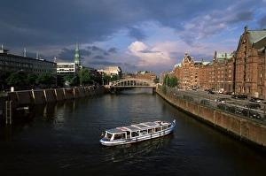 Speicherstadt Prints: Excursion boat on canal in the Speicherstadt