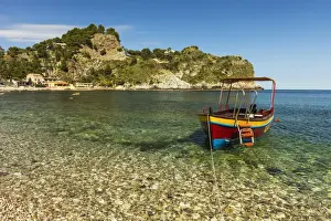 Taormina Prints: Excursion boat moored on pretty Isola Bella Bay in this popular northeast tourist town