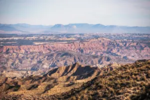 Granada Prints: Expansive desert and mountain landscape showcases the natural beauty of Gorafe in Granada
