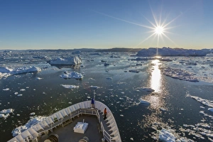 Ilulissat Prints: Expeditions ship amongst huge icebergs, Ilulissat, Greenland, Polar Regions