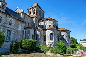 Gardening Prints: Exploration of Abbey Church of Saint Savin sur Gartempe in France with historical architecture and natural surroundings