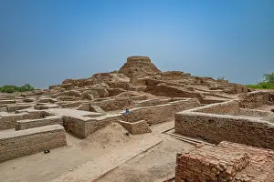 Large Prints: Exploration of ancient ruins at Moenjodaro in Pakistan showcases remnants of a historic civilization