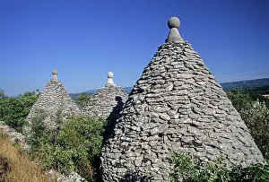 Crafts Prints: Exploration of dry stone huts known as Borie in the Provence region of France during a sunny day