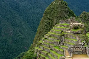 Indigenous Prints: Exploration of Inca architecture at Machu Picchu reveals terraces and stone structures in the Andes mountains of Peru