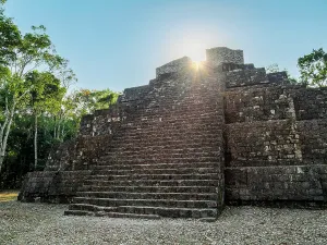 Tours Prints: Exploration of Maler Group ruins during sunrise at Yaxha Archaeological Site in Guatemala