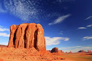 Tall Prints: Exploration of sandstone formations under blue skies in Monument Valley Navajo Indian Territory Utah USA