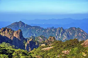 Geopark Prints: Explore the beauty of Huangshan Ancient Peaks under clear blue skies in Anhui Province