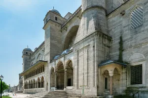 Middle Prints: Explore the entrance of Suleymaniye Mosque in Istanbul during a sunny day