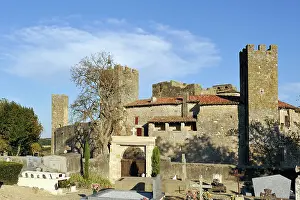 Cemetery Prints: Explore the fortified village of Larresingle with its ancient walls and towers in Gers