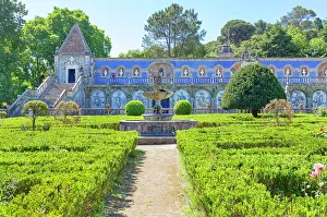 Ornamental Prints: Explore gardens of Palace of the Marquises of Fronteira in Lisbon with intricate designs and greenery in the background